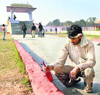 Preparations in full swing at the Ramlila Maidan in New Delhi on Wednesday ahead of Delhis new Chief Minister Arvind Kejriwals swearing-in ceremony