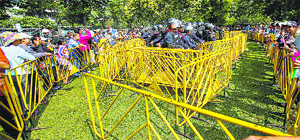 Anti-riot policemen surrounded by barricades after being detained by protesters during a rally in Bangkok on Wednesday. 