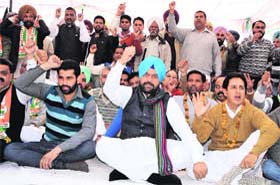 Congress leaders sit on hunger strike in Bathinda on Thursday in protest against the plugging of sewer and water connections of bill defaulters