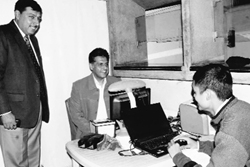 Union Information and Broadcasting Minister Manish Tewari with the UT Treasury Officer, Rajiv Tewari, at Treasury Complex in Sector 17 on Thursday. Tribune Photograph