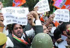 Activists of the Bharatiya Janata Yuva Morcha (BJYM) protest against Congress vice-president Rahul Gandhis double standards on the issue of corruption, in New Delhi on Thursday