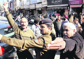 Traders hold a protest against the new traffic plan in Dehradun on Thursday. 
