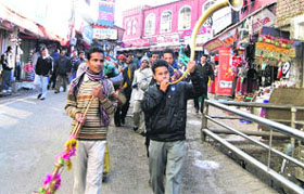 Artistes rehearse for a roadshow ahead of the Winterline Carnival in Mussoorie on Thursday.