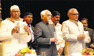 Vice-President of India Hamid Ansari (centre) , Governor Jagannath Pahadia and Chief Minister Bhupinder Singh Hooda release a book Rajya Sabha Mein Chaudhary Ranbir Singh at Chaudhary Ranbir Singh Centenary Memorial Lecture, organised at MDU in Rohtak on Thursday.