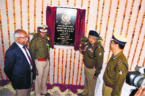 CRPF Director-General Dilip Trivedi (right) inaugurates a newly constructed officers' mess at the Group Kendra near Khewra village in Sonepat on Thursday.