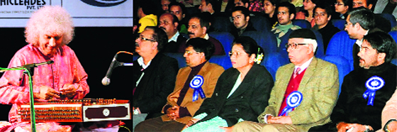 Governor NN Vohra and his wife Usha Vohra enjoy a performance by santoor maestro Pandit Shiv Kumar Sharma in Jammu on Wednesday. A Tribune Photograph
