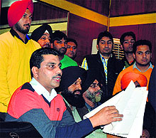 Ramesh Bangar, president of the Active Anti-Corruption Group, addresses the media on Thursday