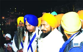 Sikh activist Gurbaksh Singh Khalsa (second from right) at the Golden Temple in Amritsar on Thursday