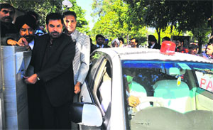 Mayor Subhash Chawala inaugurates the new automated paid parking lot at Sector 17, Chandigarh, on Friday.