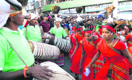 rtistes from Andhra Pradesh present their folk dance at a cultural parade organised as part of the Winterline Carnival in Mussoorie on Friday.