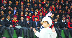 Students look on as a child participates in the rabbit race during the annual athletics meet at KVM School in Ludhiana on Friday. Tribune Photo: Himanshu Mahajan