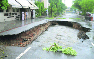 A road outside Dhami Eye Hospital that caved in during the rainy season in Ludhiana.