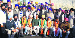 SAD members welcome Maksudran sarpanch Bir Balraj Singh into the Akali fold. A tribune photograph