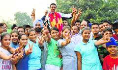 Athlete Bikramjit Singh gets a rousing welcome on his arrival to Ludhiana after competing in an international meet. A File photograph