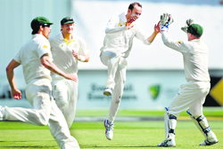 Australian spinner Nathan Lyon celebrates his 100th Test wicket on the third day of the fourth Test match against England in Melbourne on Saturday. AFP