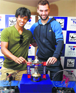 Somdev Devvarman and Benoit Paire of France unveil the trophy of the ATP Chennai Open on Saturday. PTI