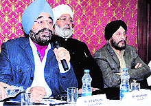Amritsar Hotel and Restaurant Association (AHARA) president APS Chathah addresses members of various hotel associations in Amritsar on Sunday