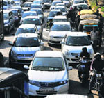 A traffic jam on the road dividing Sector 31 and the Industrial Area, Phase II, in Chandigarh on Sunday.