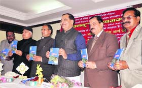 State Congress unit president Yashpal Arya, along with other digntaries, releases a book, Uthkhanan, in Dehradun on Sunday