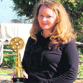 Lisa Sabina Hurley with her trophy at Matra Sadan ashram in Haridwar on Sunday