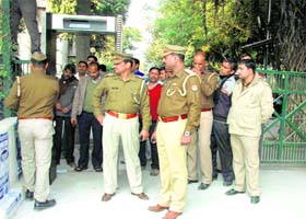 Security challenge: Police personnel screen visitors outside Delhi CM Arvind Kejriwals residence