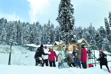 A group of tourists having a merry time in Gulmarg, 54 km from Srinagar. 