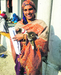 A jail inmate with a cat on the premises of the Kapurthala jail on Sunday.