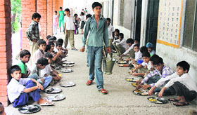 Mid-day meal being served to student at a government school in Jalandhar.