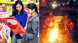 Girls buy New Year greetings card at the Model Town market; and (right) homeless people light up fire to protect themselves from the chilly breeze in Jalandhar on Sunday.