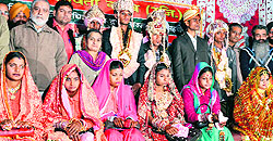 Office-bearers of Ma Bhagwati Club with the newly-wed couples in Ludhiana on Sunday