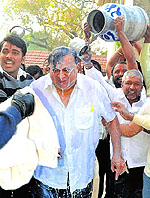 Maharashtra Labour Minister Hasan Mushrif being given a 'milk bath' in Kolhapur on Friday