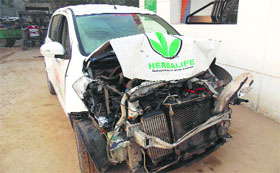 The mangled remains of a car