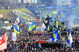 Pro-European integration protesters hold a rally at the Independence Square in central Kiev on Sunday.