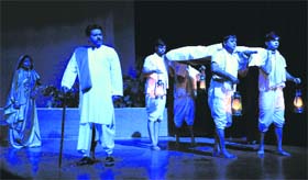 Artistes enact a scene from the play, “Jeevit Ya Mrit”, at the Tagore Theatre, Sector 18, in Chandigarh on Monday