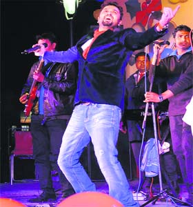 Singer Roshan Prince performs during the New Year Extravaganza at the Sector 17 Plaza in Chandigarh on Monday