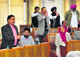 Councillors discuss a point during the General House meeting in Sector 17, Chandigarh, on Monday