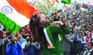 Pop singer Vandana Vadera performs as the NSUI activists celebrate the passing of Lokpal Bill at Jantar Mantar in New Delhi on Monday