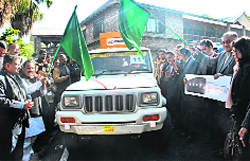 Chief Minister Vijay Bahuguna flags off a vehicle donated by the Mahindra group in Dehradun on Monday. A Tribune photograph
