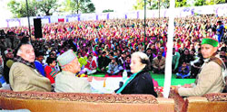 Transport Minister GS Bali, Chief Minister Virbhadra Singh, IPH Minister Vidya Stokes and Chief Parliamentary Secretary Jagjeewan Pal at a public meeting in Sullah near Palampur on Monday.