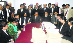 Justice SK Mittal, a Punjab and Haryana High Court judge, during a lok adalat in ludhiana.