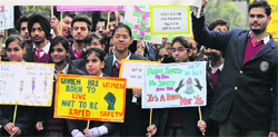 Students participate in a rally on womens safety organised by KBDAV, Sector 7, Chandigarh, on Tuesday. a tribune photograph