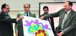 Justice Surya Kant (extreme right) of the Punjab and Haryana High Court launches the logo of Chandigarh Volunteers at GGD SD College, Sector 32, Chandigarh, on Tuesday. 