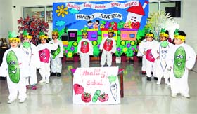 Students of Bal Bharti Public School perform on the school premises in Ludhiana on Tuesday