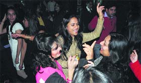 Dance till you drop: Residents celebrate at Geoffrey's to welcome New Year 2014 in Ludhiana on Tuesday