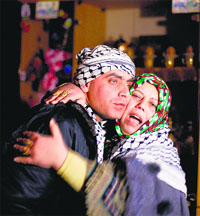 Freed Palestinian prisoner Rami Barbakh, who was held by Israel for 20 years, is hugged by his mother at his house in Khan Younis, in the southern Gaza Strip, on Tuesday.
