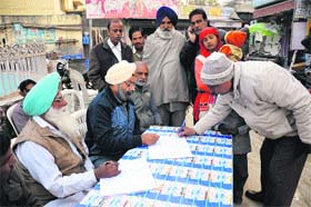 Former municipal councillor Vijay Kumar holds a grievance redressal camp in Bathinda on Wednesday