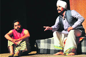 Artistes enact a scene from the play, "Saka Sirhind", at the Punjab Kala Bhawan, Sector 16, in Chandigarh on Wednesday. 