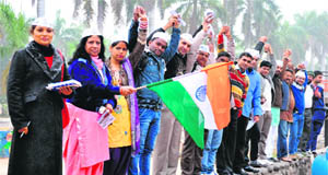 City activists of the AAP during a party campaign on the PU campus in Chandigarh on Wednesday. 