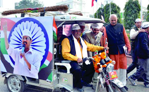 AAP MLA Rajesh Garg leaves in his bettery rickshaw after taking oath in the House of the Delhi Legislative Assembly Session on Wednesday. 