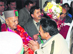 Congressmen welcome Chief Minister Virbhadra Singh at the Bhuntar airport in Kullu on Wednesday. Photo: Abhinav Vashisht 